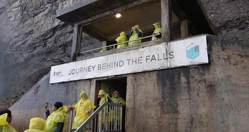 People at Journey Behind the Falls in Ponchos